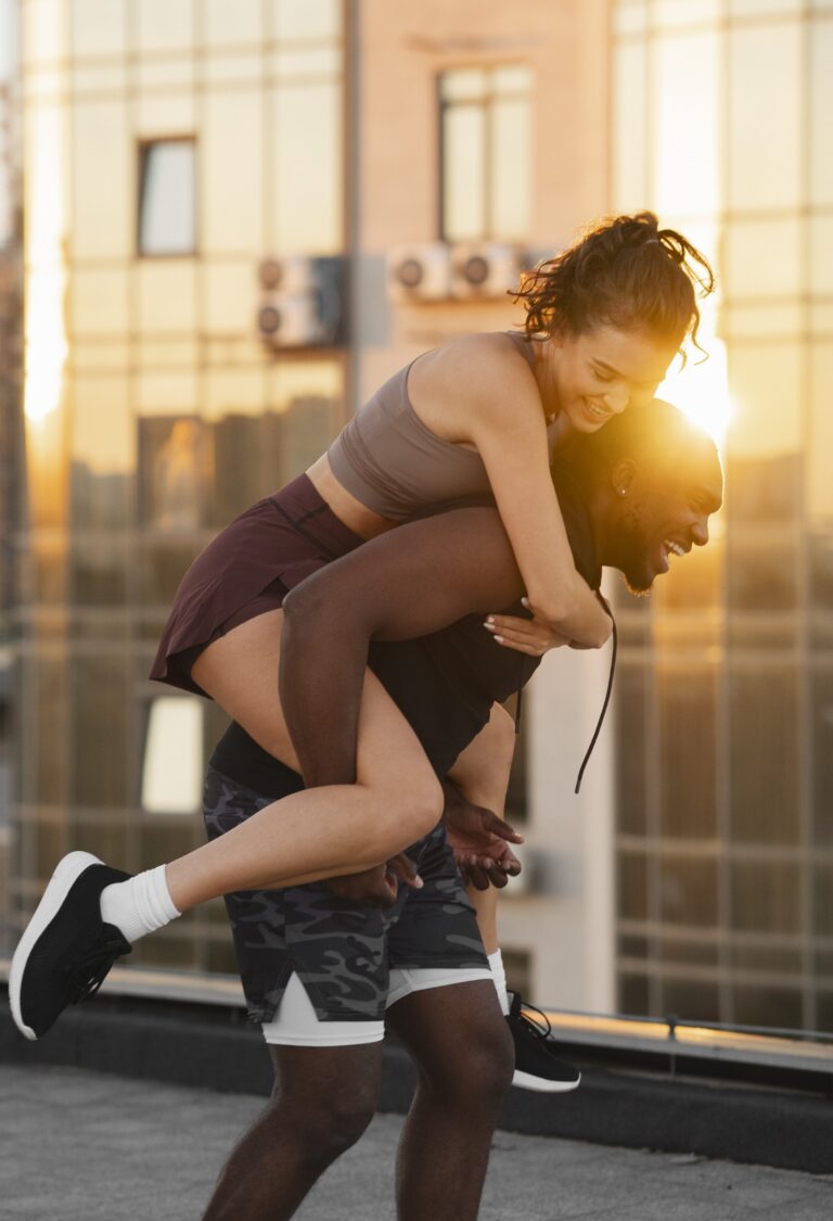 people-working-out-together-sunset-outdoors